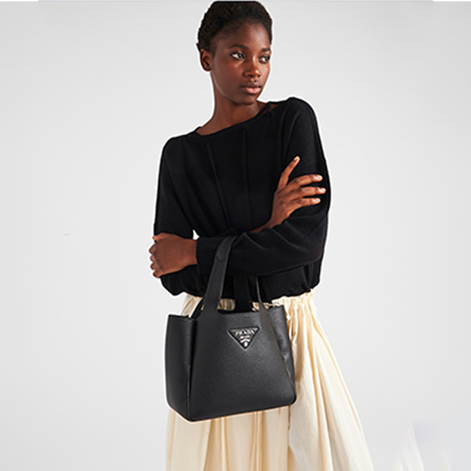prada pebbled leather mini tote handbag with triangle metal logo